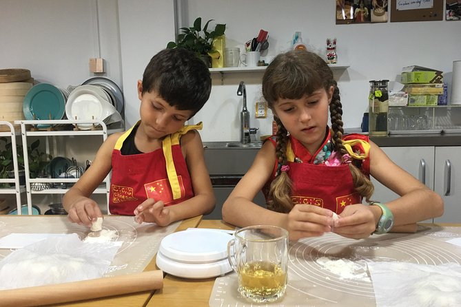 2.5hrs Chinese Kitchen Cooking Class: Xiaolongbao Soup Dumplings - Sauce and tea: small add-ons that make the meal complete