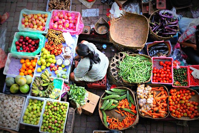 Balinese Cooking class with traditional morning market visit - Making canang offerings before you cook