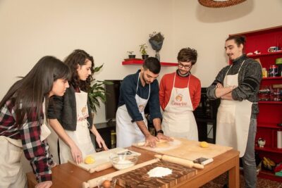 Bologna Walking Tour & Traditional Cooking Class with Wine - Entering the Cesarine home: a “real-life” cooking class