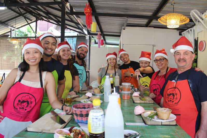 Chiang Mai: Half Day Morning Cooking Class with Market Tour - Arriving at Yummy Tasty Thai Cooking School: Your Station, Snacks, and No AC