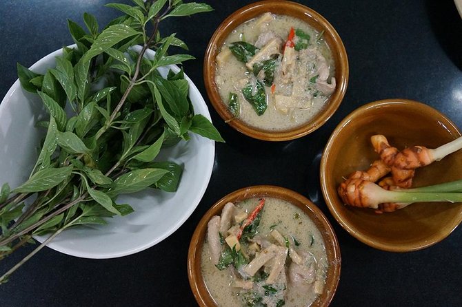 Chiang Mai Home Cooking Class with Garden Tour & Hotel Transfers - Enter Pea’s teak home: from garden herbs to the stove
