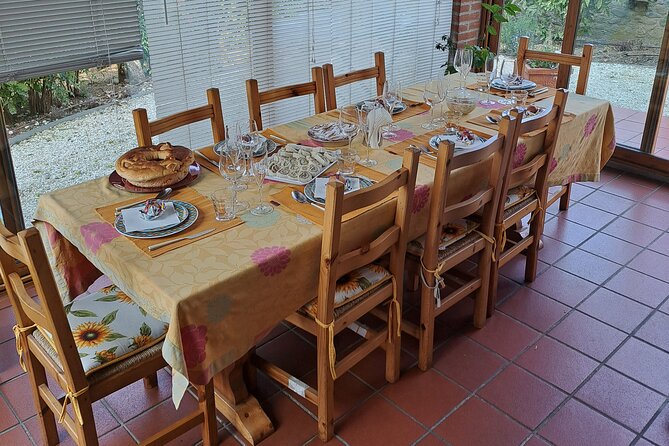 Cooking class in a garden: handmade pasta - Learning the tricky bits: rolling thickness and folding that stays even