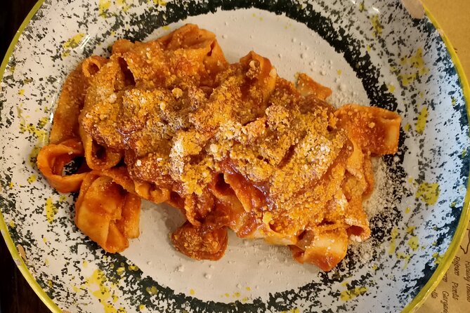 Cooking Class in Rome: Make Fettucine & Tiramisù with Chef Paolo - The meal part: wine, water, and a finish with limoncello