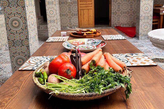 Cooking Class with Lacals in Marrakech . - Lunch at the table: sides, couscous, and fruit salad