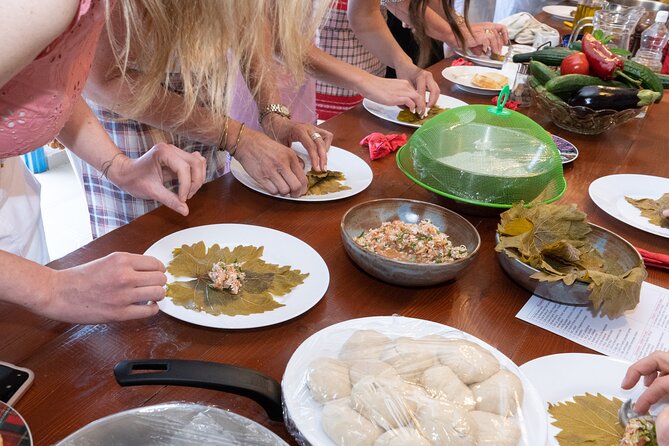 Cretan Cooking Class and Dinner: Evening in a Rethymno Home - The Dinner Table Moment: Wine, Raki, and a Lot of Food