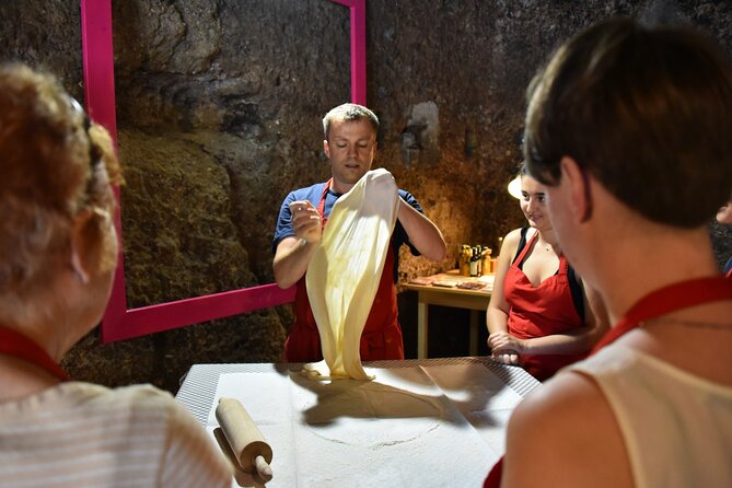 Dinner Cooking Class - Prezels, Dumplings, Apple Strudel & Music - Inside Edelweiss Cooking School: cave setting and small-group energy