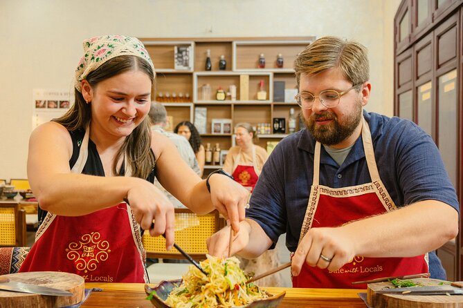 Experience Hanoi Cooking Class with Free Wine Tasting - From Đồng Xuân Market to Your Cutting Board
