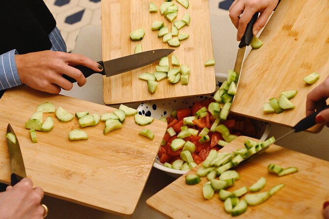 "Fetaverse" Private Cooking Class in Koukaki Athens - The set-table feast: moussaka or gigantes, plus wine and beer