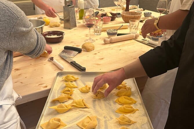 Florence: Pasta Cooking Class with Unlimited Wine - Entering a medieval tower near Brunelleschi’s Dome