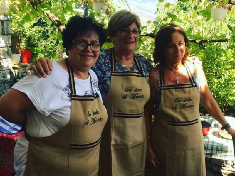 Gjirokastër: Traditional Albanian Vegetarian Cooking Class - Meet Marjeta: the raki start, the small group pace, and the translator