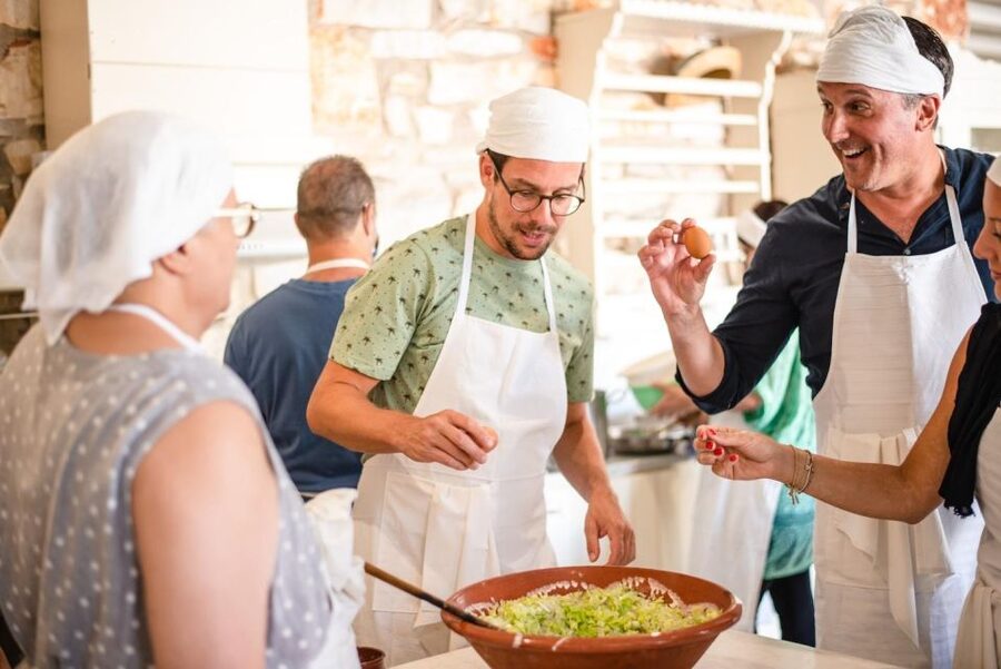Greek Cooking Class with a Local Chef, Wine, & Meal in Drios - Welcome Aperitif: Wine, Souma, and the Menu Story
