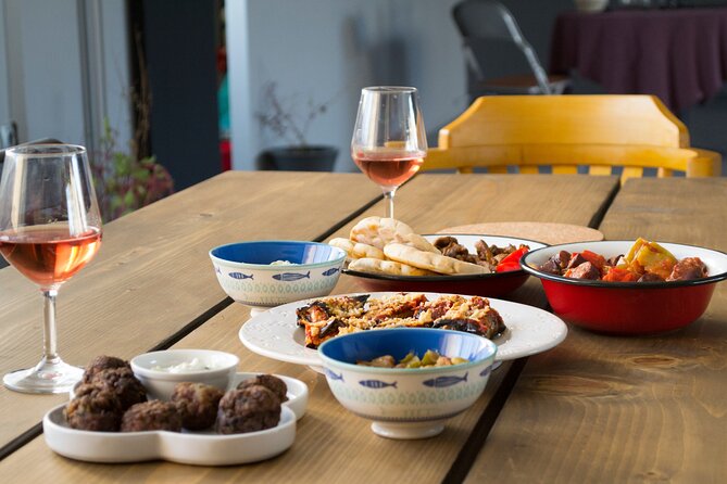 Greek Meze Cooking class and dinner with an Acropolis view - Step Into CookinAthens on Evripidou 90