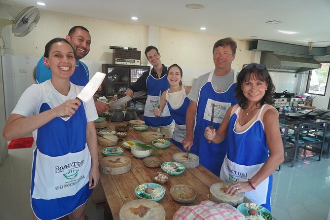 Half Day Guided Thai Cooking Class in Chiang Mai - Inside the indoor kitchen: how the lesson likely unfolds