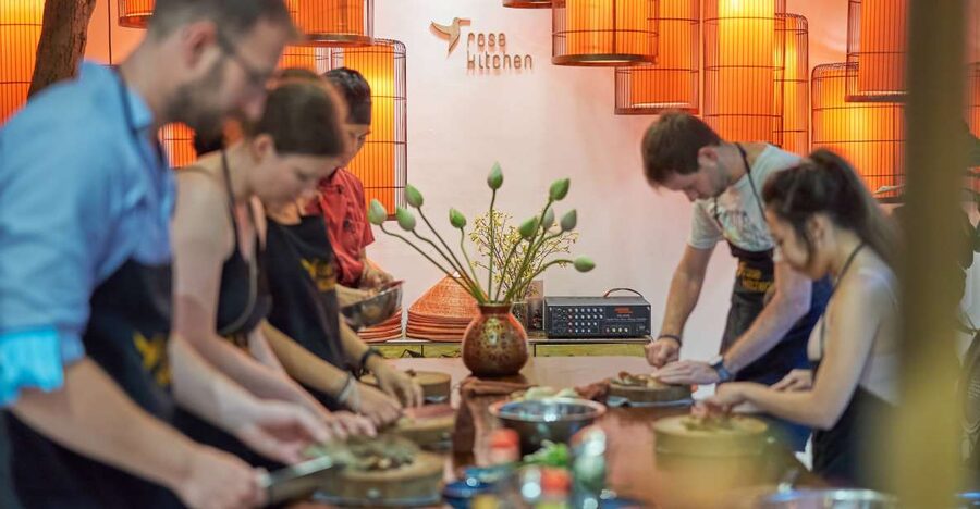 Hanoi: Cooking Class in a Local Villa with Market Tour - From street stalls to a cozy villa kitchen
