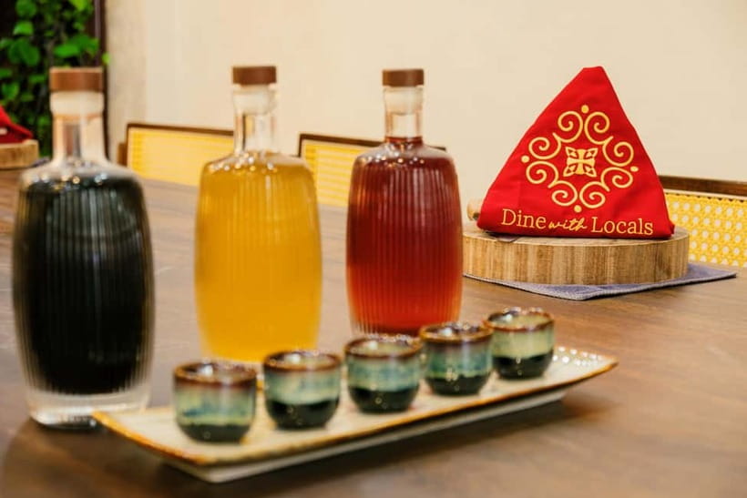 Hanoi Cooking Class: Market Tour, Free Recipe & Beverages - Lunch with a local family and homemade wine pairing