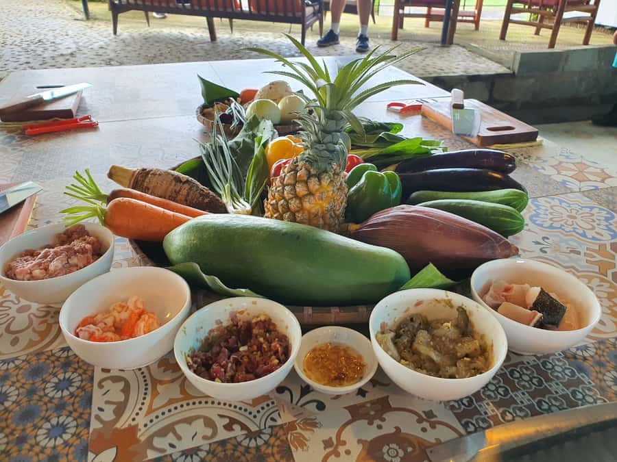 Hoi An Cooking Class With Market and Bamboo Basket Boat Tour - Back to the Kitchen: Hands-On Cooking with Lou and the Team