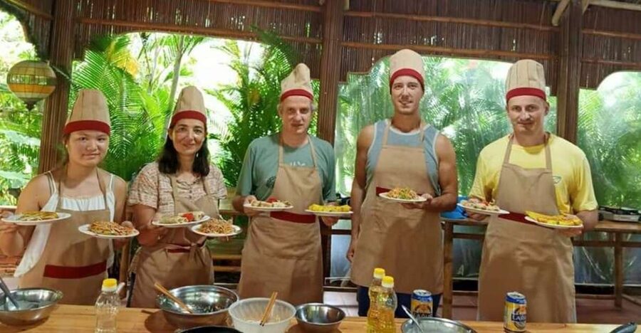 Hoi An: Evening Cooking Class with Locals in Herbs Village - What happens when you arrive: welcome drink, then right into cooking