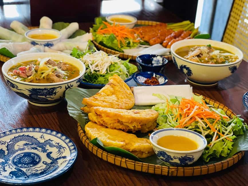 Hue City: Cyclo, Market Tour & Cooking Class at Madam Thu - Madam Thu Welcome Drink and Herbal Foot Bath
