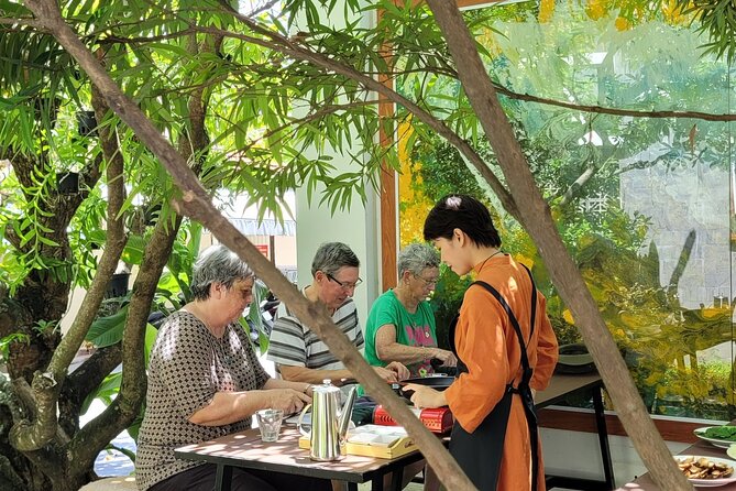 Hue's Vegetarian Cooking Class in Ancient Garden - Arriving at An Nhien Garden Vegetarian Restaurant (and Getting Oriented Fast)