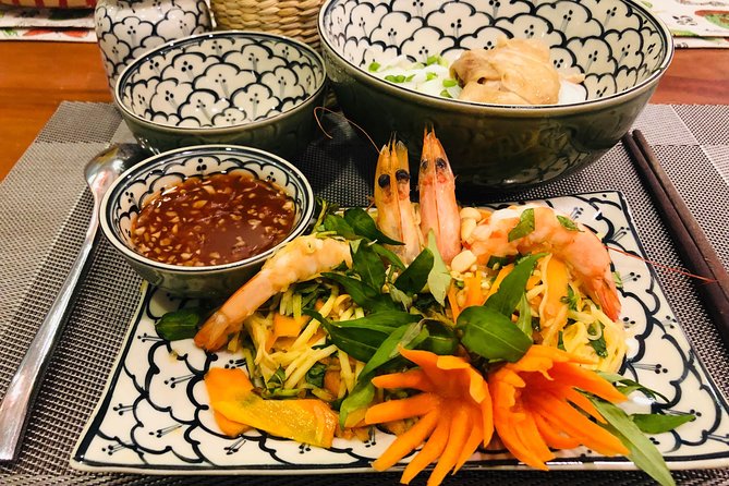 Immersive Cooking Class & Wet Market Tour by Local Chef +Cookbook - The hands-on menu: what cooking “iconic” really feels like