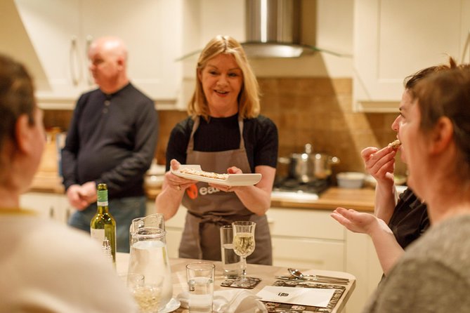 Irish Craic & Cuisine: Cooking Class & Dinner in Central Dublin - Dinner time with good craic: eating what you made