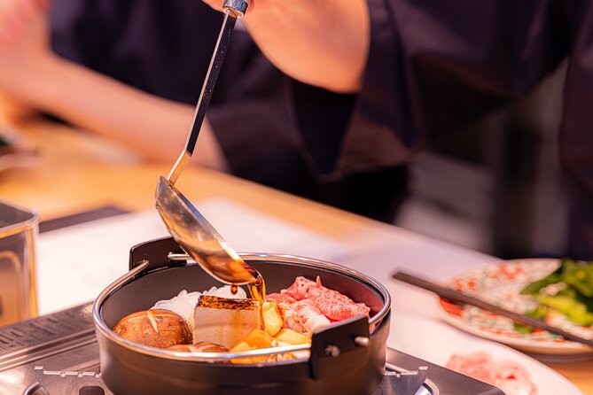 Japanese Sake Tasting & Wagyu Sukiyaki Cooking Class in Tokyo - Vegetable carving demo: the show happens while you cook
