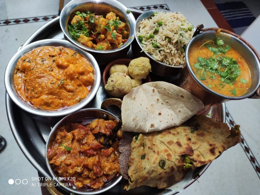 Jodhpur 9 Dishes Cooking Class Experience pickup and drop - Clean kitchen, bottled water, and comfort that matters