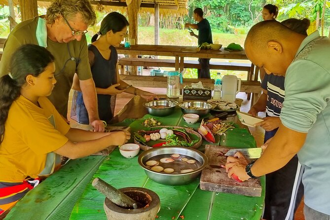 Khao Sok Local Life Adventure & Traditional Cooking Class - Bamboo Rafts on the Sok River: Limestone Cliffs and Slow-Drift Relaxation