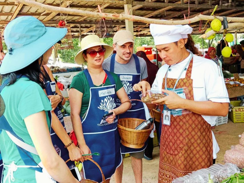 Ko Lanta: Thai Cooking Class with Market Tour and Dinner - The cooking class technique: herbs, curry paste, and that calm patience