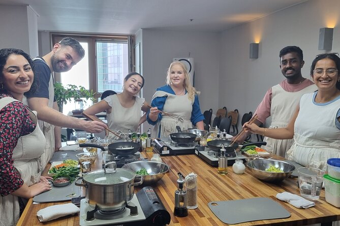 Korean cooking class in Haeundae, Busan - First Moments: Welcome Drink, Apron Story, and Min’s Teaching Style