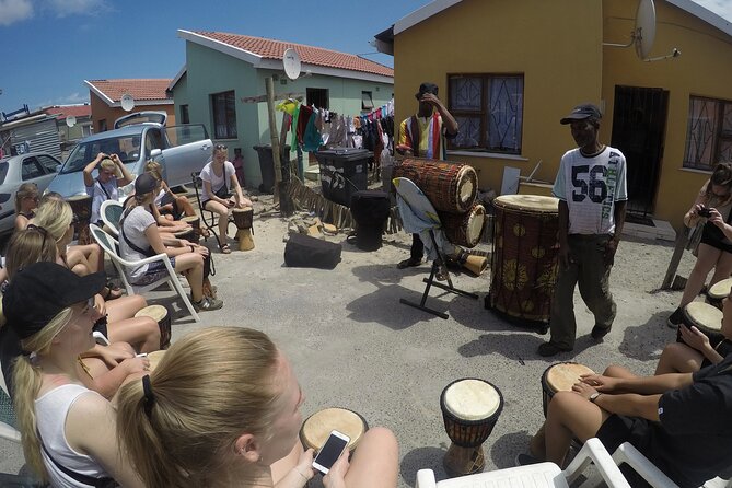 Langa Township and Bokaap Cooking Class Half Day Tour - Bo-Kaap in 45 minutes: colorful houses, Dutch touches, and Cape Malay spices