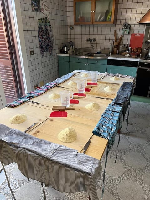 Lecce Home Cooking Class: Craft Orecchiette & Savor Wine - Dinner at the Table: Wine Toasts, Homemade Bread, and Limoncello