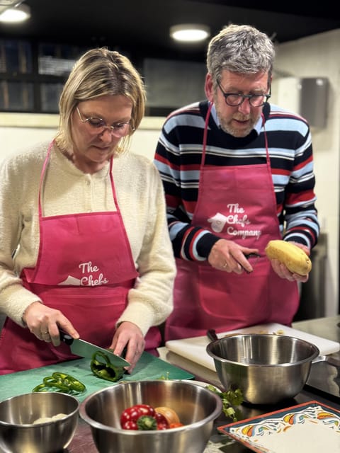 Lisbon: Traditional Portuguese Cooking Class - The opening spread: finger food, wine and beer to set the tone