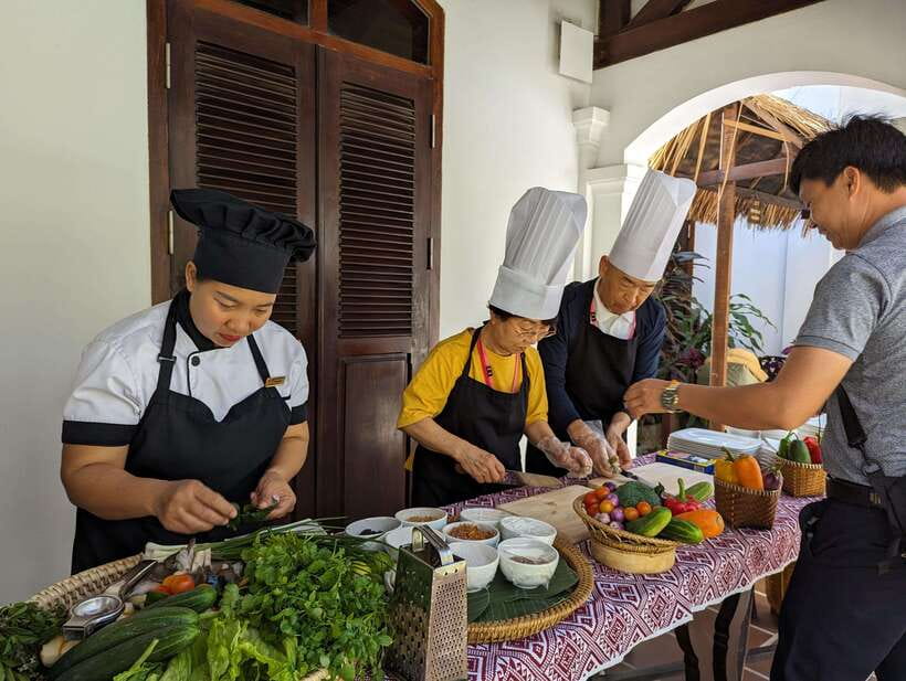 Luang Prabang: Cooking Class at the Former Royal Palace - From market to kitchen: the quiet gap where the chefs prep
