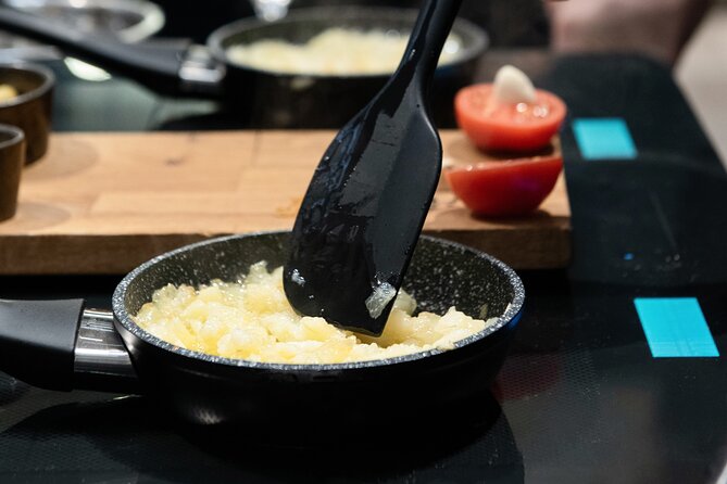 Madrid Spanish Omelet Cooking Class and Bottomless Wine brunch - Starters and sweet finish: ensaimada, honey-style flavors, churros, and coffee