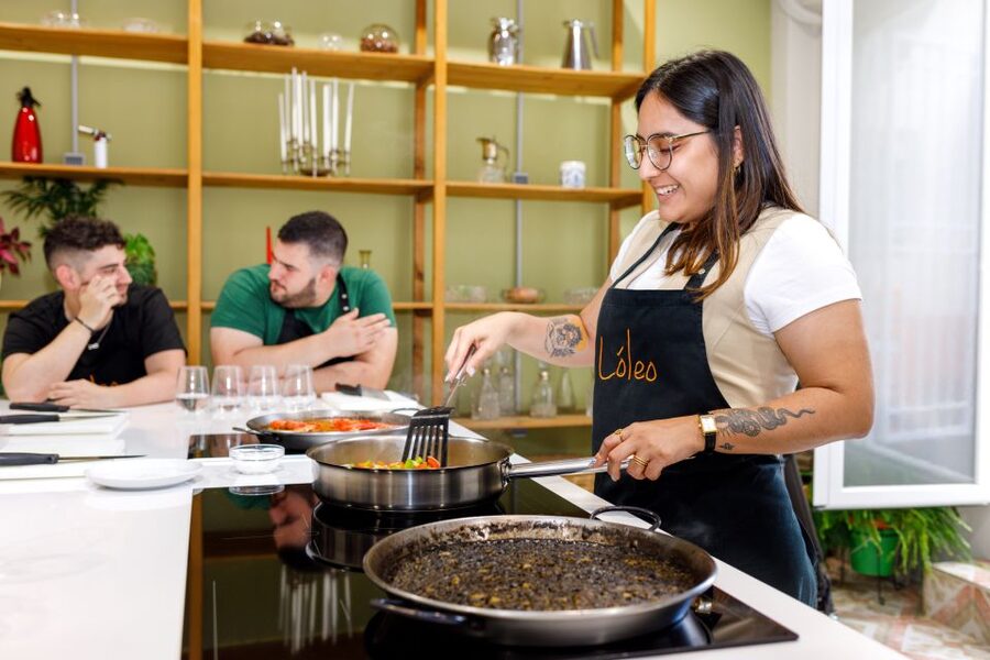 Madrid: Tapas & Paella Cooking Class with Expert Chef - A cozy Madrid kitchen with Chef Lola driving the lesson