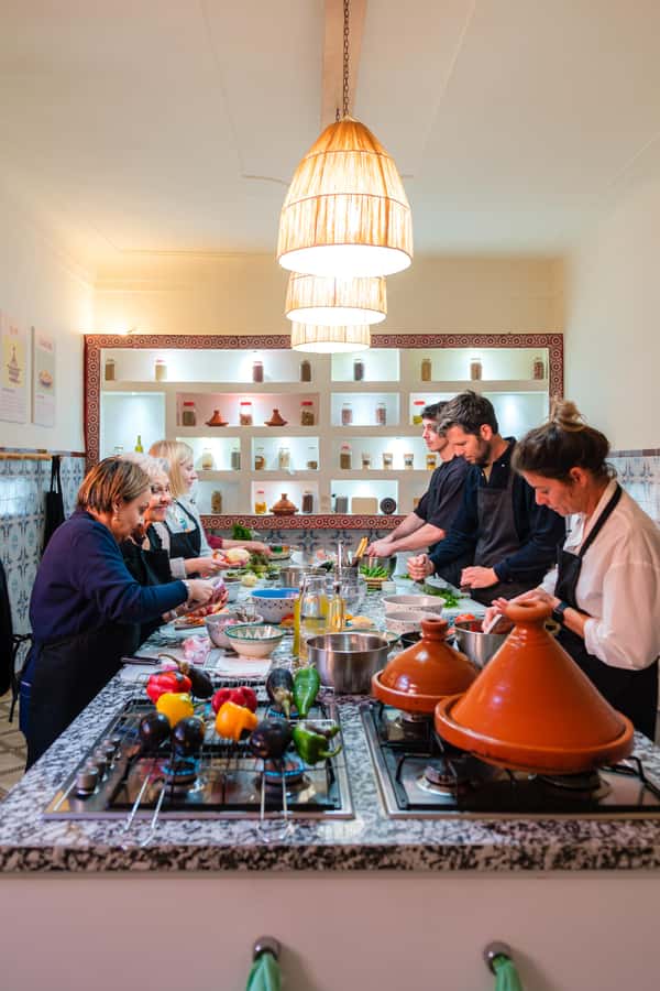 Marrakech: Moroccan Cooking Class with Market Visit and Meal - The Cooking Lesson: Tajines, Starters, and Dessert Workstations