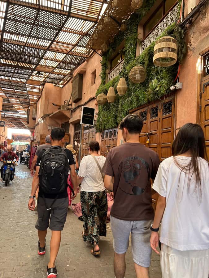 Marrakech: Traditional Moroccan Cooking Class & Market Visit - Entering the Khmisa riad in the Marrakech Medina