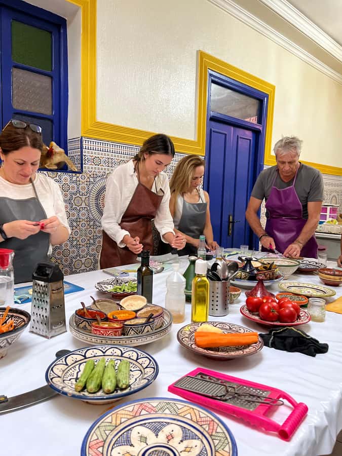 Marrakech: Traditional Moroccan Cooking Class & Market Visit - The cooking lesson: teamwork around a real Moroccan table