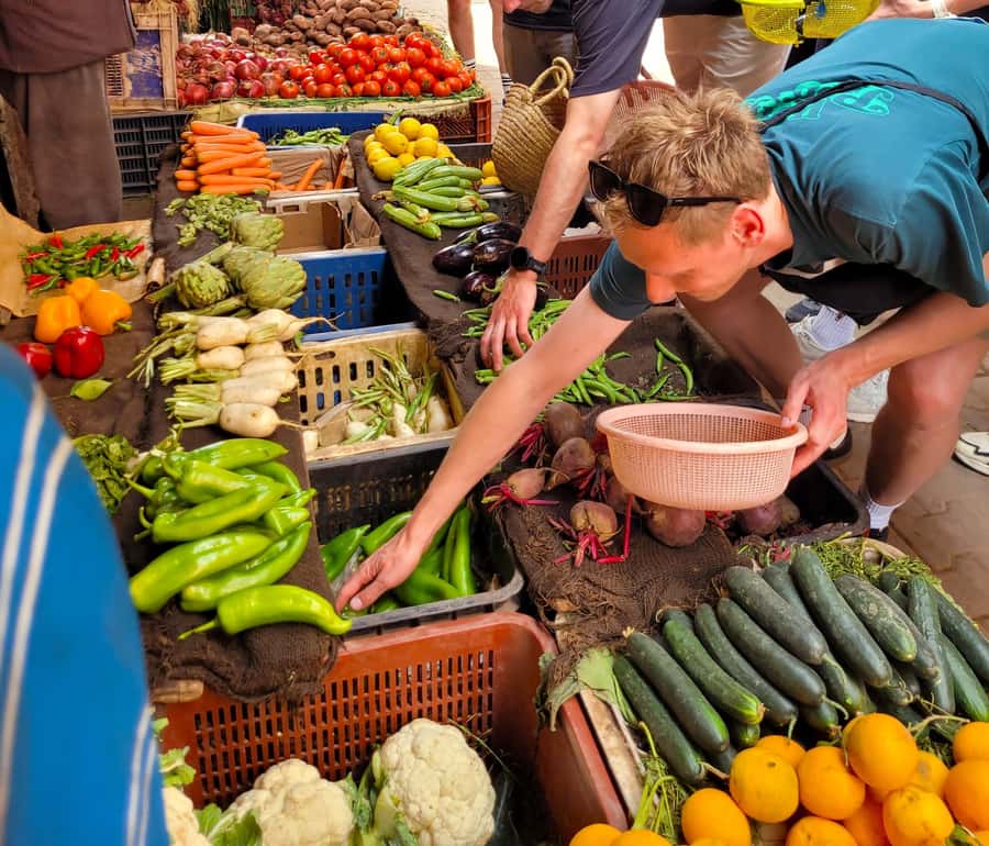 Marrakesh: Moroccan Dishes Cooking Class with a Local Chef - From Pharmacie Bab Doukkala to the market: where your cooking starts