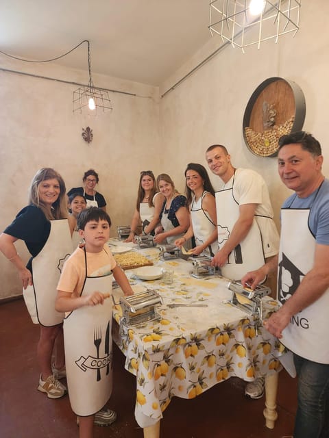 Milan: Pasta and Tiramisu Cooking Class with Wine - Prosecco welcome and the kitchen-running-real-life setup