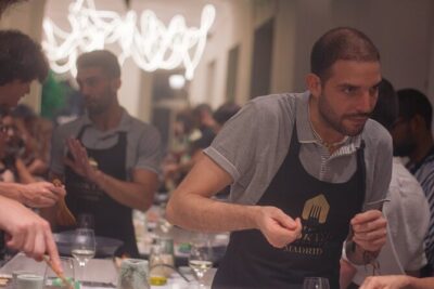Paella Cooking Class in Madrid with Bottomless Wine Pairing - Where You Start: Cooking Clubhouse Near Calle de Atocha