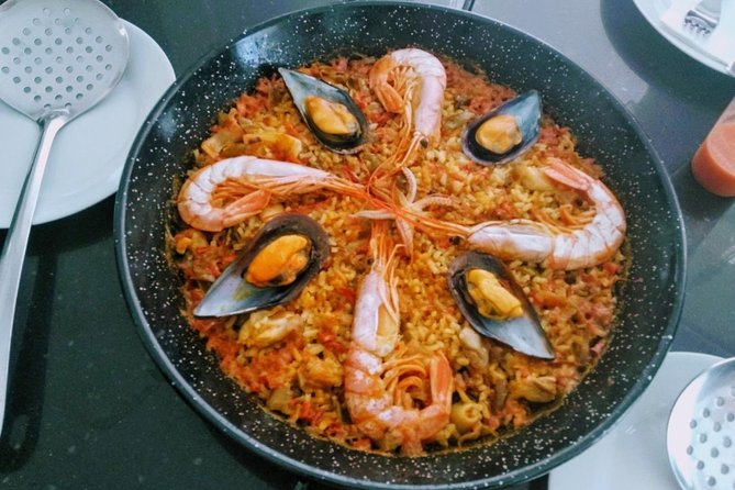 Paella Cooking Class in Malaga - Making paella your way: sofrito, rice, and the gradual build