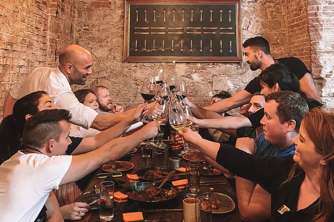 Paella Cooking Class with Professional Chef: Four Course Dinner - Drinks and Atmosphere: Fun Energy, Music, and Social Tables