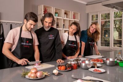 Premium Paella & Tapas Feast: Unlimited Wine & Rambla Views - Back to Barcelona Cooking: how the kitchen keeps you hands-on