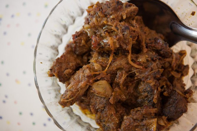 Private South Indian Home Cooking Class in London with a Local - From kitchen table to back patio: eating like family