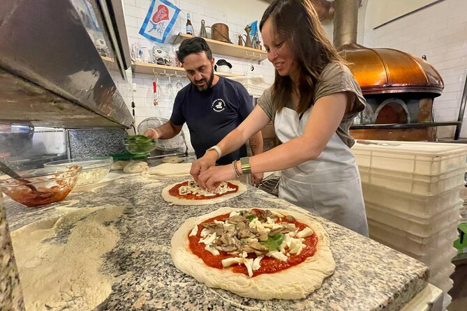 Rome: Neapolitan Pizza Cooking Class in Front of the Vatican - The Bake: Getting Pizza Out of the Oven (The Best Part)