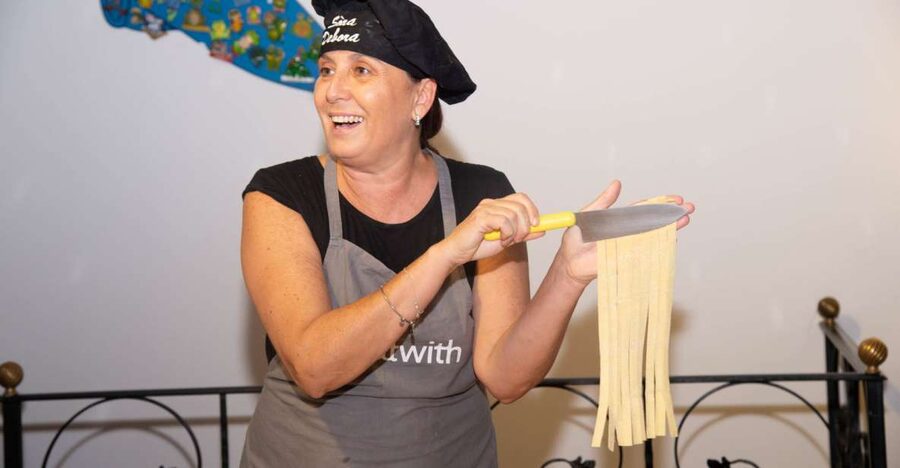 Rome: Pasta and Tiramisu Shared Cooking Class with Wine - Welcome bruschetta and included wine in a local kitchen