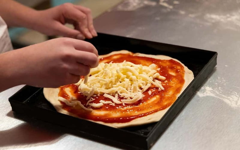 Rome: Pizza and Tiramisù Cooking Class with Glass of Wine - Making Roman-Style Pizza Dough With Flour and Water