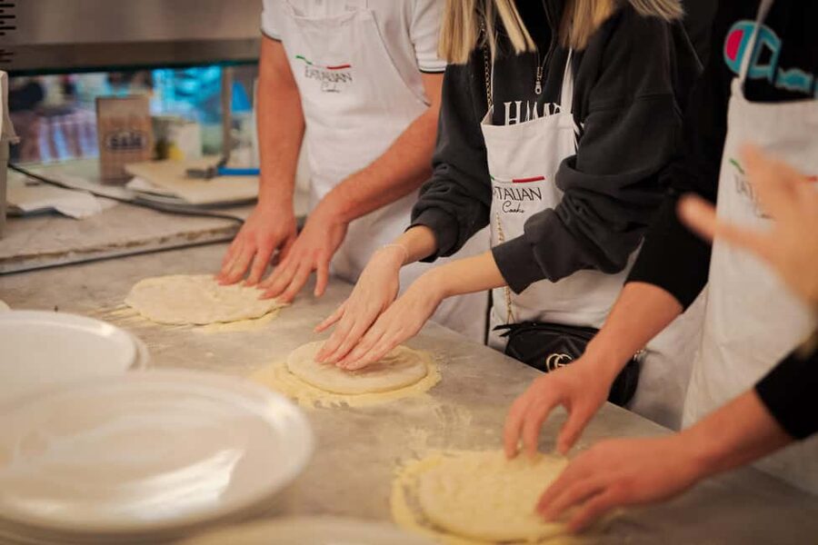 Rome: Pizza Cooking Class in Piazza Navona with Drinks - Bruschetta and Drinks: The Meal Portion Feels Like Rome